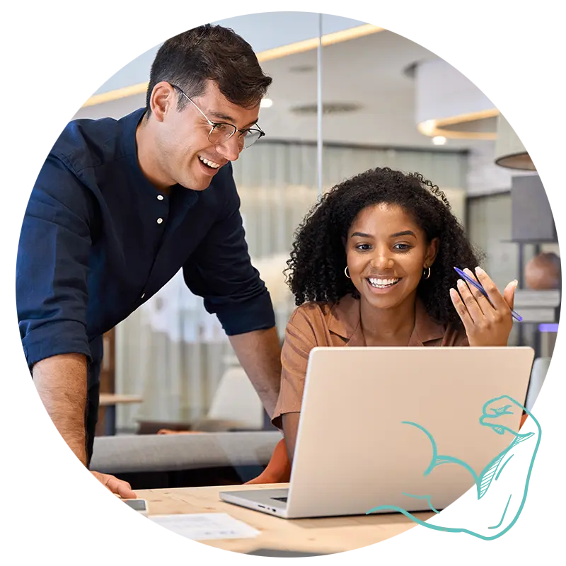 Two people confidently using AI on a laptop